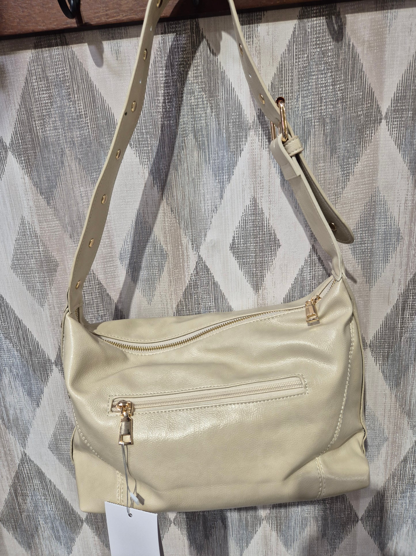 Bolso tachas
