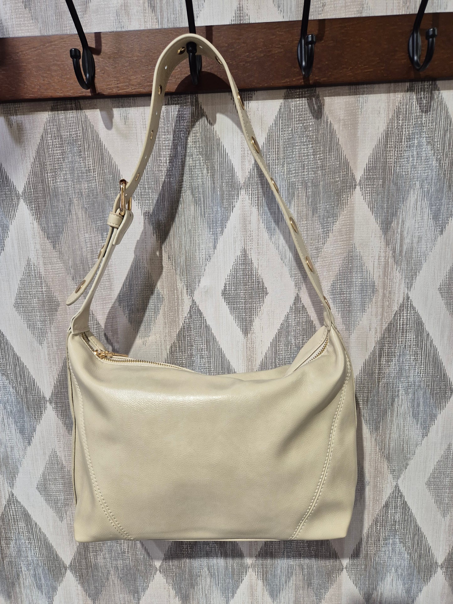 Bolso tachas