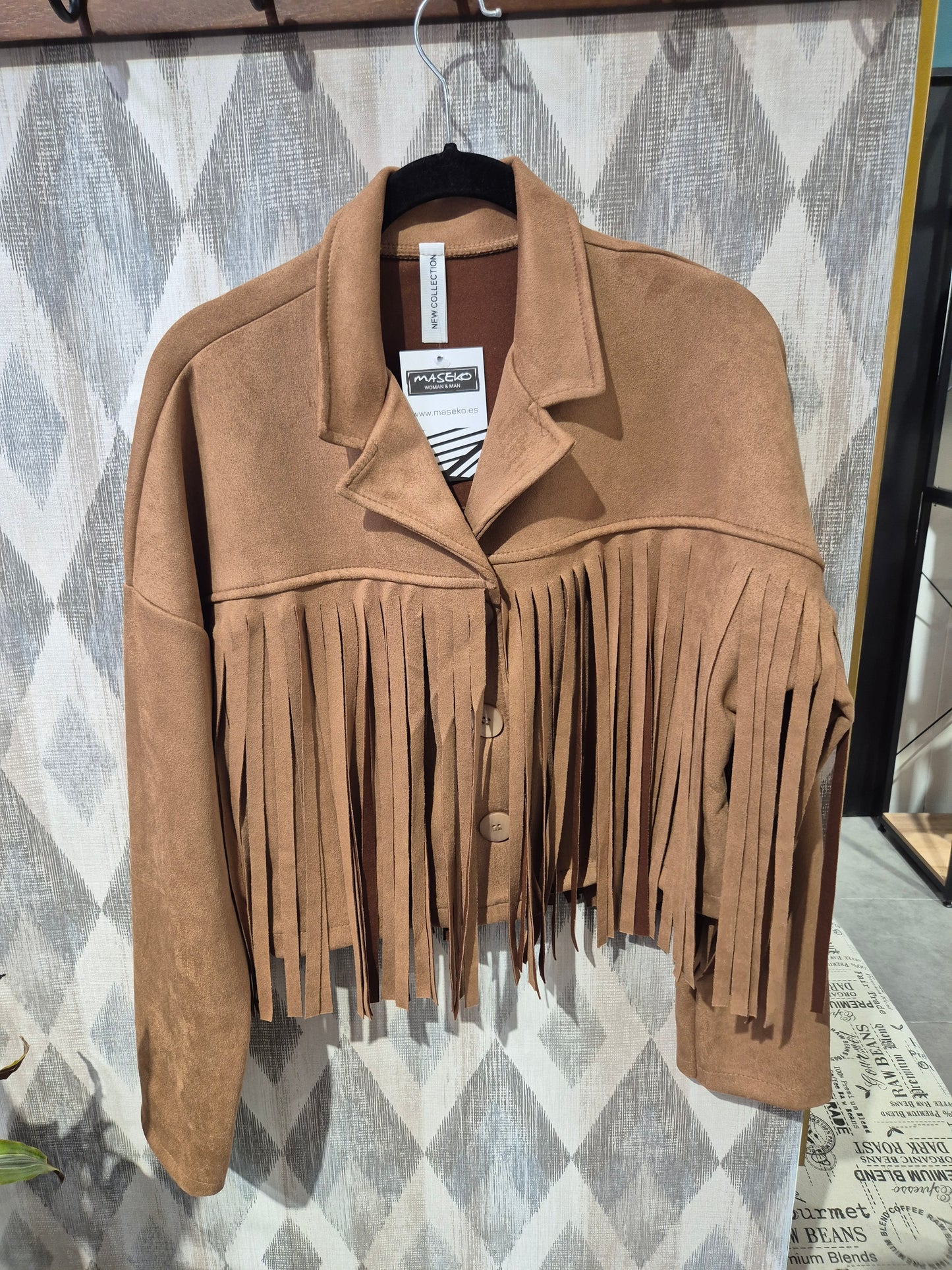 Chaqueta flecos