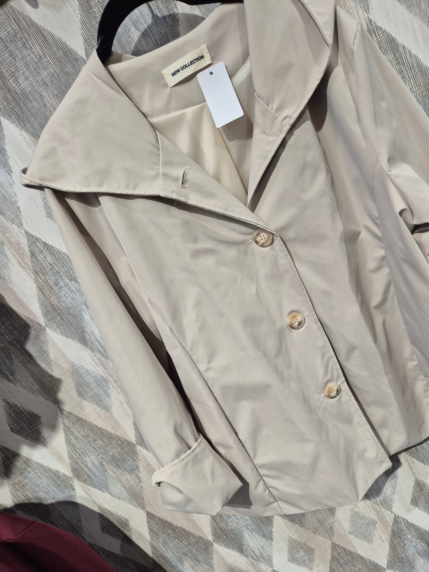 Gabardina con capucha