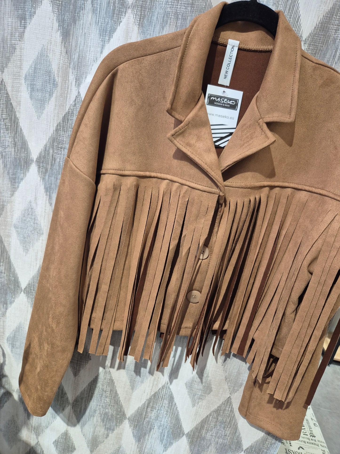 Chaqueta flecos